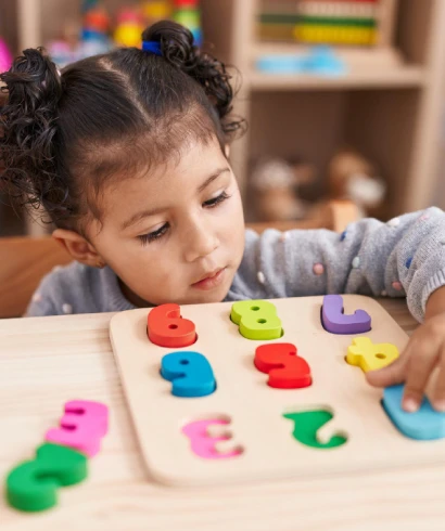 Child drawing and coloring